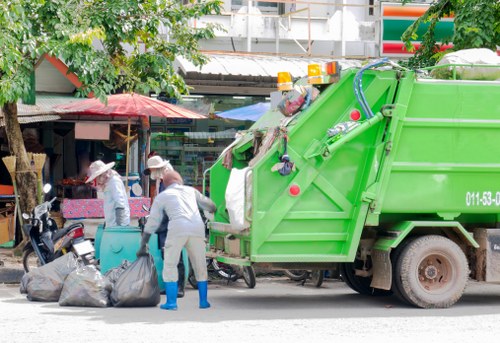 Residents clearing household waste