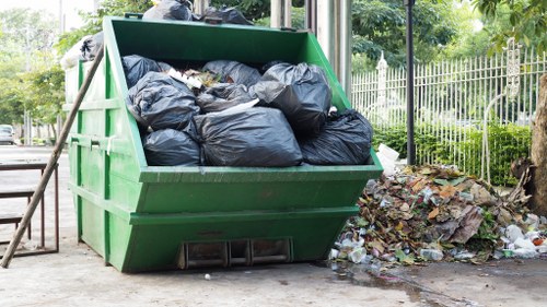 Electric rubbish collection vehicle in South London